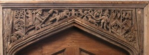 A door carved with a hunting scene at Rhydarwen, Llanarthne.