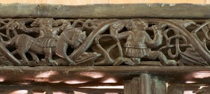 A hunting scene carved in wood at Saint Melangell Church, Pennant Melangell, c.15th century.