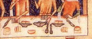 A detail from the dining room scene from the Luttrell Psalter, c.1325-1335.